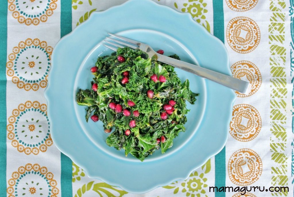 Kale cooked with lemon and garlic and garnished with raisins or pomegranate seeds