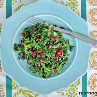 Kale cooked with lemon and garlic and garnished with raisins or pomegranate seeds