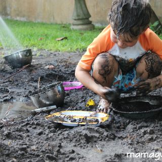 Little boys play in mud and get messy at Mud Day for Kids